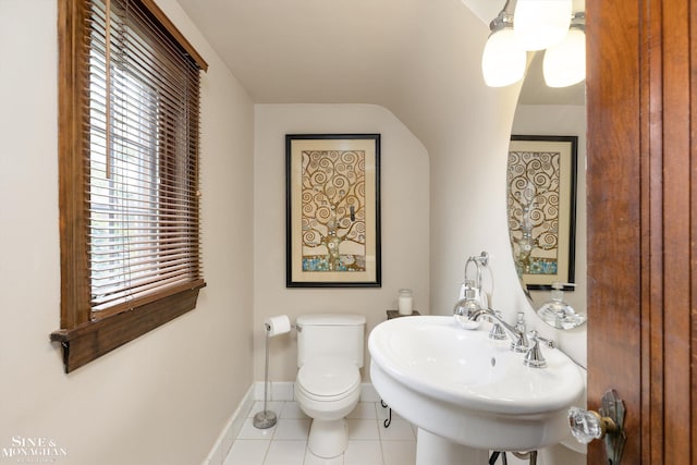 1264 Bedford Rd, Grosse Pointe Park, MI 48230 - bathroom featuring tile patterned flooring, toilet, baseboards, and a sink