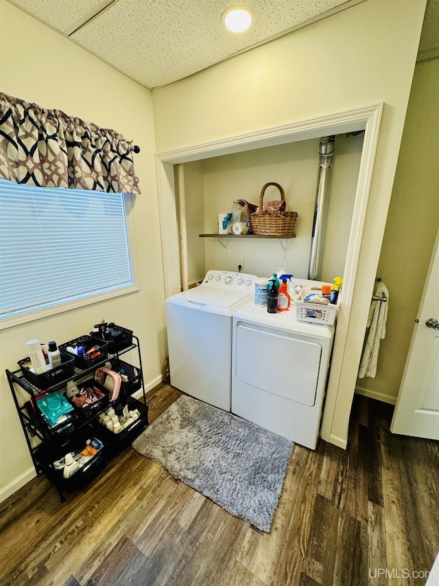 200 Marquette St, Negaunee, MI 49866 - laundry room with dark wood-type flooring, washer and dryer, and baseboards