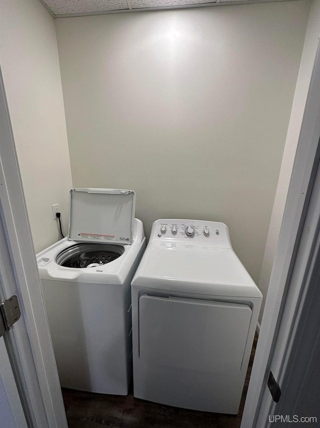 200 Marquette St, Negaunee, MI 49866 - laundry room featuring independent washer and dryer and dark wood-type flooring
