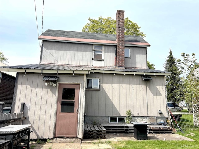 746 Maurice St, Ishpeming, MI 49849 - rear view of property featuring metal roof
