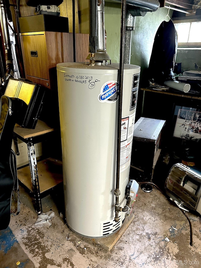 746 Maurice St, Ishpeming, MI 49849 - utility room featuring gas water heater
