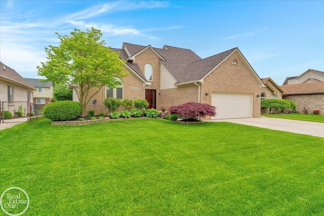 49204 Stratford Dr, Chesterfield Twp, MI 48047 - traditional-style home featuring concrete driveway, an attached garage, brick siding, and a shingled roof