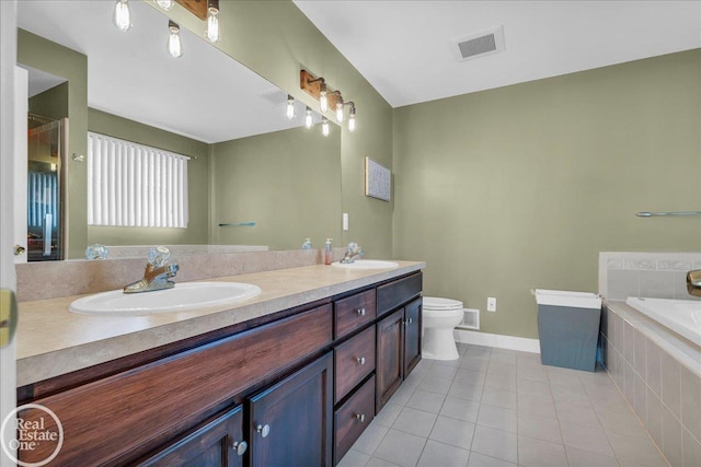 49204 Stratford Dr, Chesterfield Twp, MI 48047 - full bath featuring tile patterned floors, double vanity, a garden tub, baseboards, and toilet