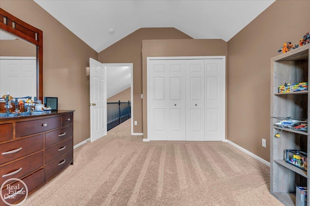 49204 Stratford Dr, Chesterfield Twp, MI 48047 - bedroom featuring lofted ceiling, light carpet, a closet, and baseboards