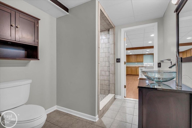 49204 Stratford Dr, Chesterfield Twp, MI 48047 - full bath with toilet, vanity, a stall shower, baseboards, and tile patterned floors