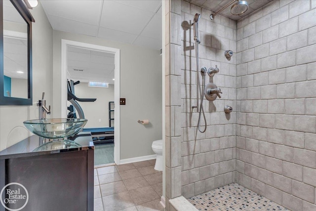 49204 Stratford Dr, Chesterfield Twp, MI 48047 - full bath featuring a tile shower, vanity, toilet, and tile patterned flooring