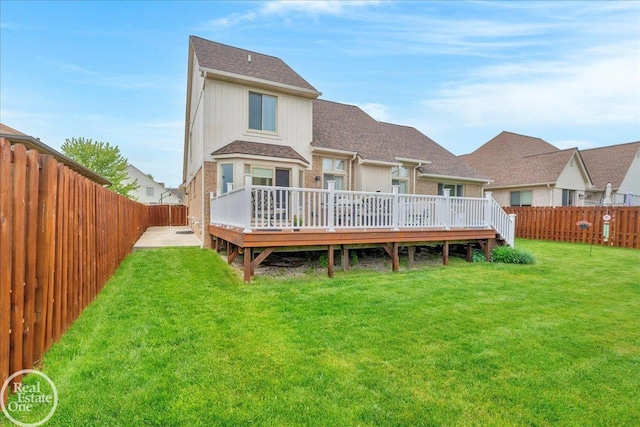 49204 Stratford Dr, Chesterfield Twp, MI 48047 - back of property with a deck and roof with shingles