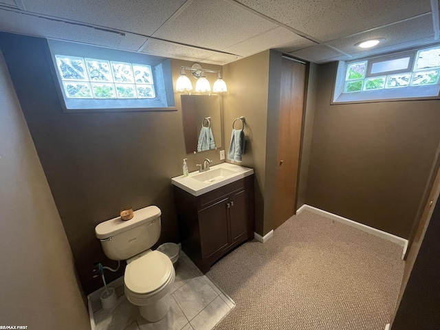 2029 Manchester Rd, Grosse Pointe Woods, MI 48236 - bathroom with toilet, vanity, and a paneled ceiling