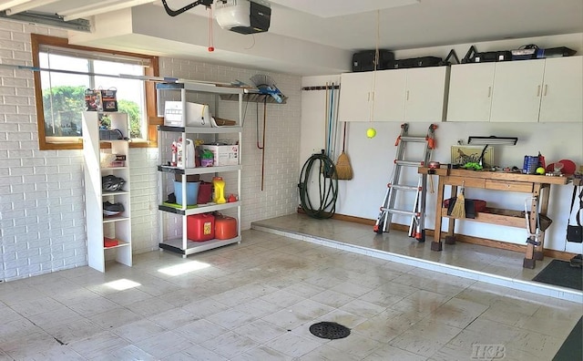 1750 Castleview Ct, Gladwin, MI 48624 - garage featuring a garage door opener