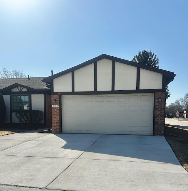 5408 Holy Cross Ct, Warren, MI 48091 - ranch-style home with brick siding, concrete driveway, and an attached garage