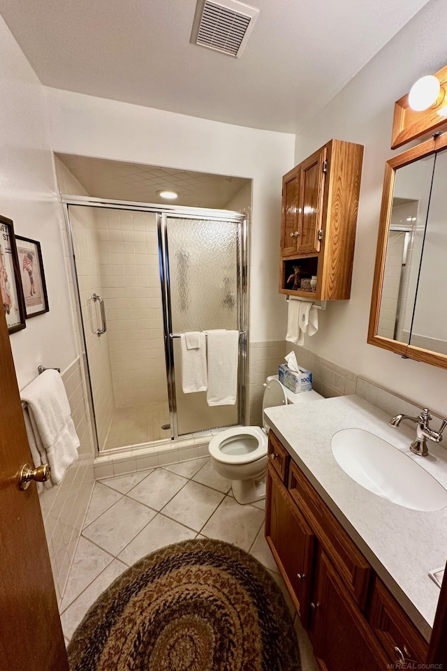 5408 Holy Cross Ct, Warren, MI 48091 - full bathroom featuring vanity, a stall shower, tile patterned floors, and toilet