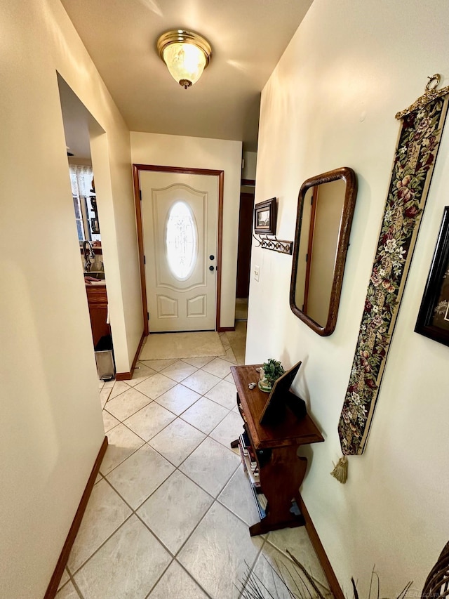 5408 Holy Cross Ct, Warren, MI 48091 - foyer featuring baseboards and light tile patterned flooring