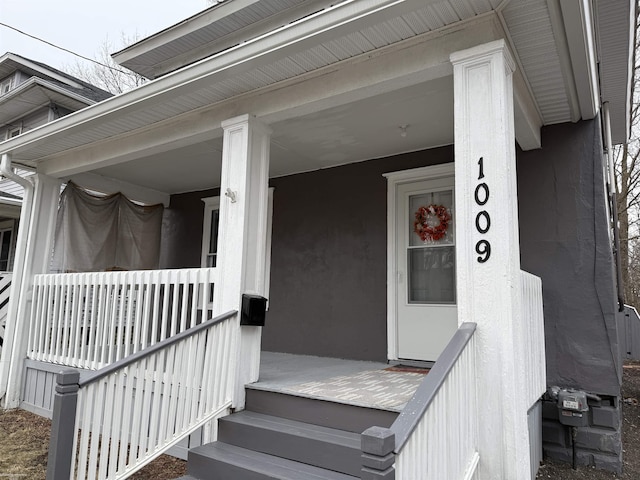 1009 May St, Lansing, MI 48906 - property entrance with a porch