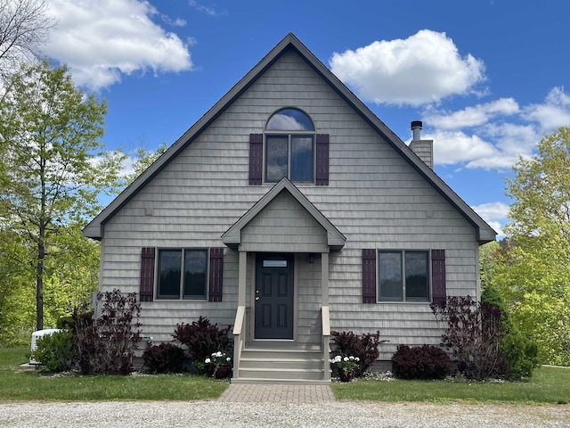 8046 Wallace Dr, Lake, MI 48632 - bungalow-style house with a chimney
