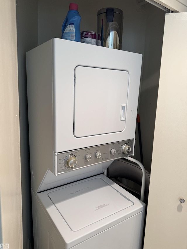 5000 Town Ctr Unit 801, Southfield, MI 48075 - laundry room featuring stacked washer / dryer