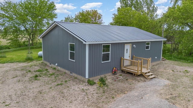 2695 Hupter Rd, Pinconning, MI 48650 - view of front of home featuring metal roof