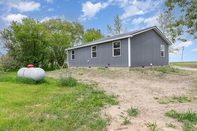 2695 Hupter Rd, Pinconning, MI 48650 - view of side of home with crawl space