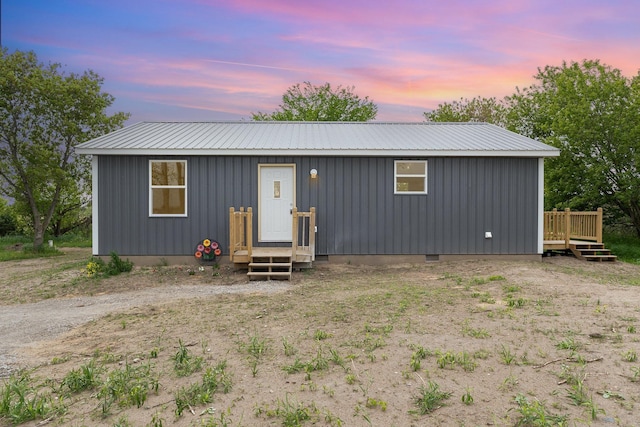 2695 Hupter Rd, Pinconning, MI 48650 - view of front facade with metal roof and a deck