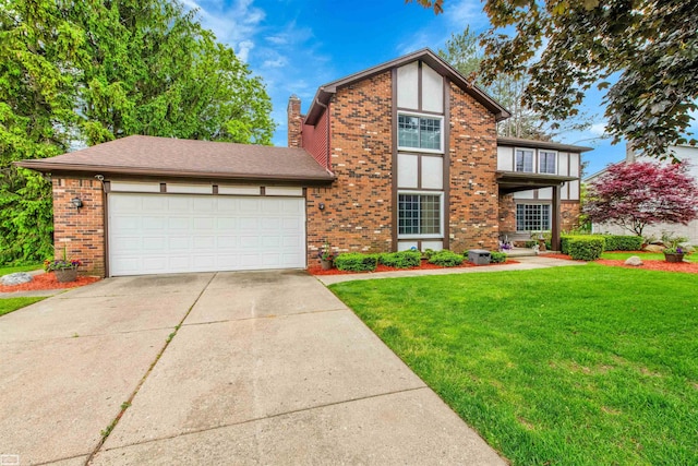 2401 Chalet Dr, Rochester Hills, MI 48309 - view of front of home with brick siding, concrete driveway, a front yard, and a garage