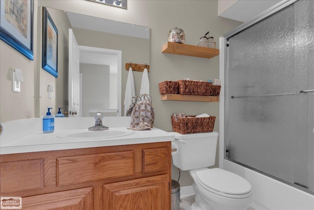 4916 Royal Cove Dr, Shelby Twp, MI 48316 - full bath featuring toilet, vanity, and combined bath / shower with glass door