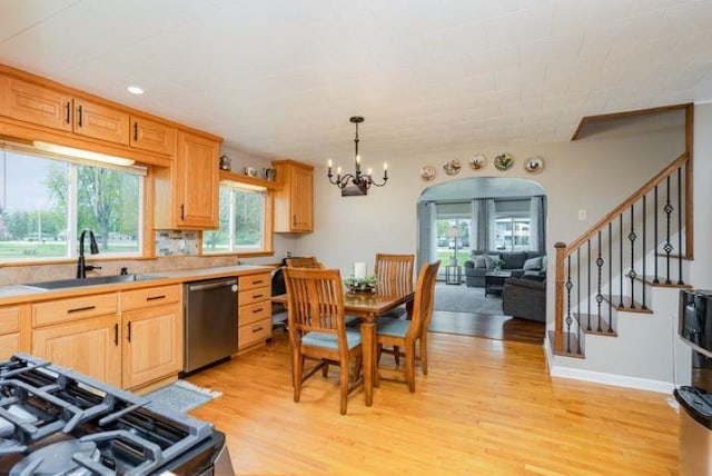 4449 S M 18 Hwy, Beaverton, MI 48612 - kitchen featuring a sink, dishwasher, light wood finished floors, a chandelier, and recessed lighting