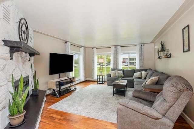 4449 S M 18 Hwy, Beaverton, MI 48612 - living area with a stone fireplace and wood finished floors