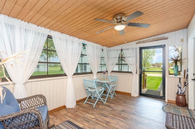 4449 S M 18 Hwy, Beaverton, MI 48612 - sunroom / solarium with vaulted ceiling, plenty of natural light, wood ceiling, wood finished floors, and baseboards