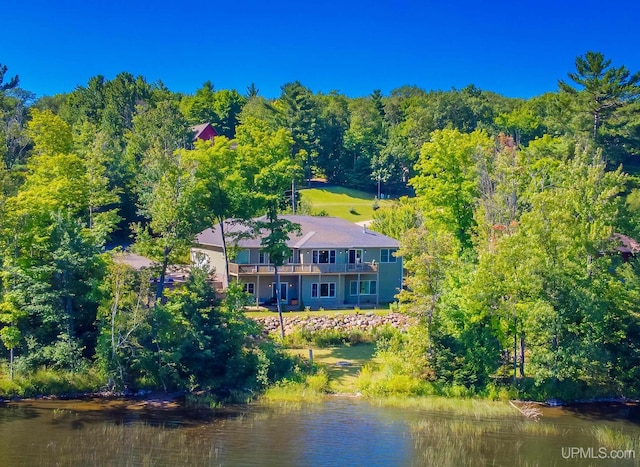 217 Shoreline Dr, Negaunee, MI 49866 - aerial view of property and surrounding area featuring a nearby body of water and a heavily wooded area