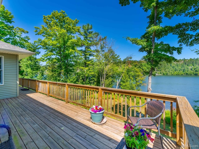 217 Shoreline Dr, Negaunee, MI 49866 - wooden terrace featuring a water view
