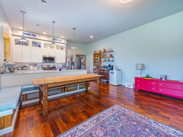 217 Shoreline Dr, Negaunee, MI 49866 - living room with dark wood-style flooring and recessed lighting