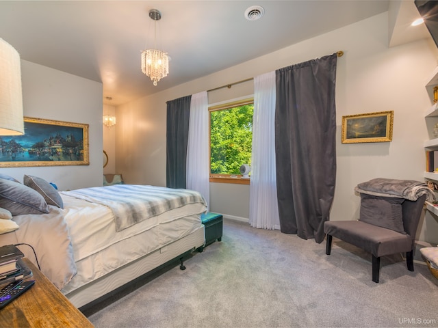 217 Shoreline Dr, Negaunee, MI 49866 - carpeted bedroom featuring a chandelier