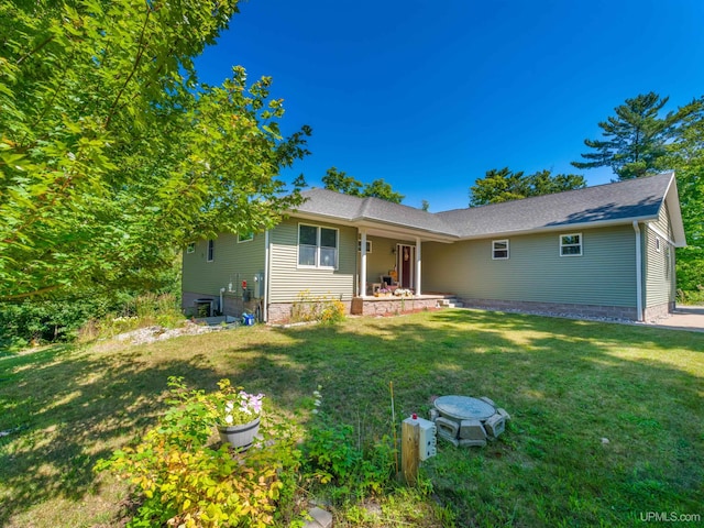 217 Shoreline Dr, Negaunee, MI 49866 - view of front of home with a front lawn