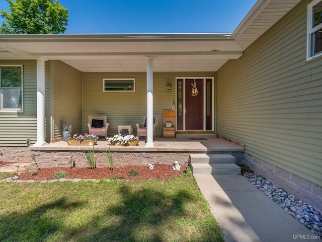 217 Shoreline Dr, Negaunee, MI 49866 - doorway to property with a porch