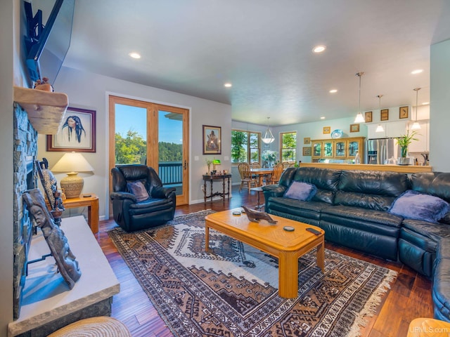 217 Shoreline Dr, Negaunee, MI 49866 - living area with recessed lighting, wood finished floors, and french doors