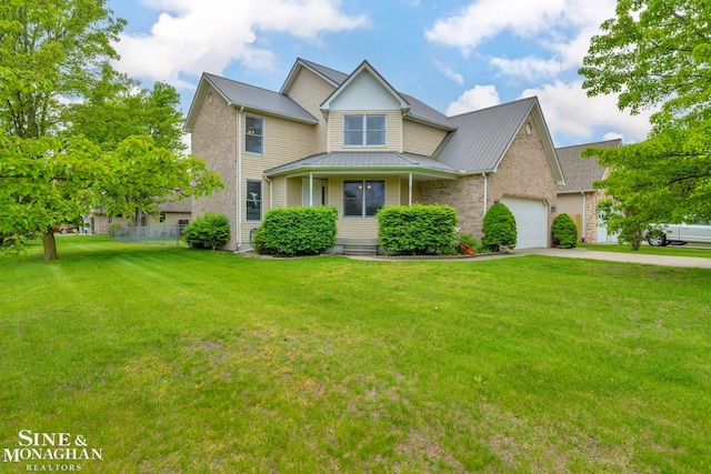 4233 Conifer Ln, Port Huron, MI 48060 - victorian home with concrete driveway, a garage, metal roof, a standing seam roof, and brick siding