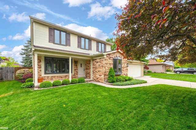 39067 Baroque Blvd, Clinton Township, MI 48038 - traditional-style house with concrete driveway, a garage, and brick siding