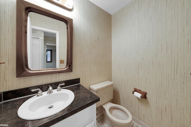 39067 Baroque Blvd, Clinton Township, MI 48038 - bathroom featuring wallpapered walls, vanity, toilet, and tile patterned floors