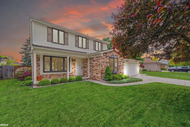 39067 Baroque Blvd, Clinton Township, MI 48038 - view of front facade featuring driveway, an attached garage, and brick siding