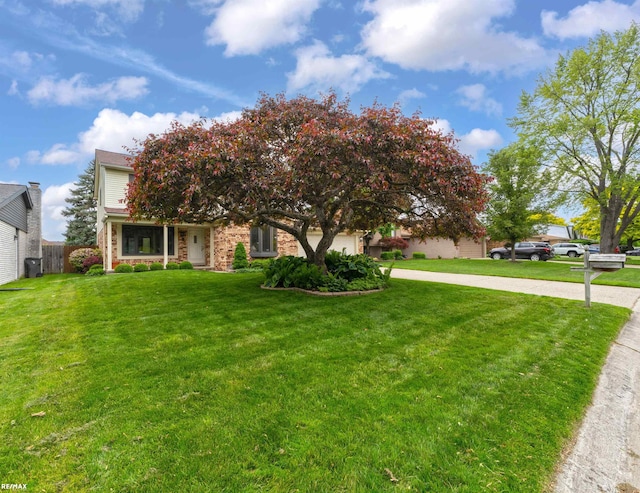 39067 Baroque Blvd, Clinton Township, MI 48038 - view of property hidden behind natural elements with driveway and a garage