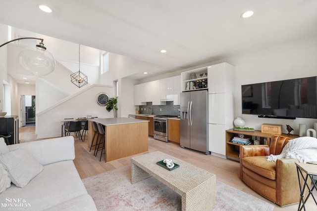 2638 John R St, Detroit, MI 48201 - living area with light wood-type flooring and recessed lighting
