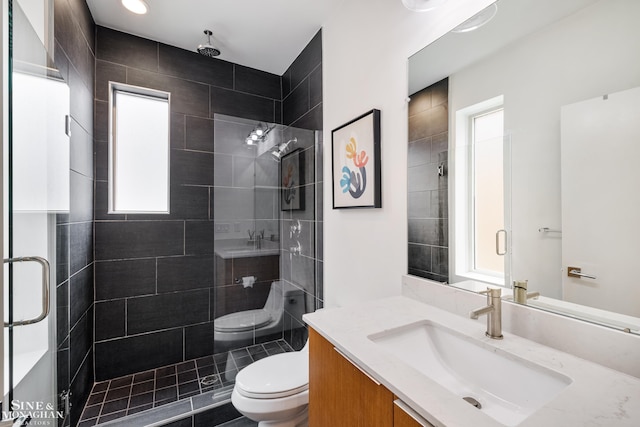 2638 John R St, Detroit, MI 48201 - bathroom featuring toilet, a shower stall, and vanity