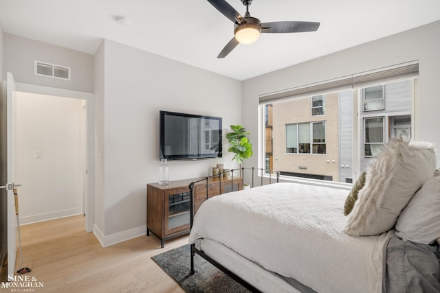 2638 John R St, Detroit, MI 48201 - bedroom featuring light wood-style flooring, baseboards, and ceiling fan