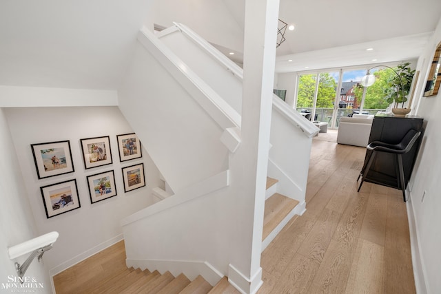 2638 John R St, Detroit, MI 48201 - stairway featuring wood finished floors, recessed lighting, and baseboards