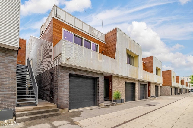 2638 John R St, Detroit, MI 48201 - view of building exterior with a garage