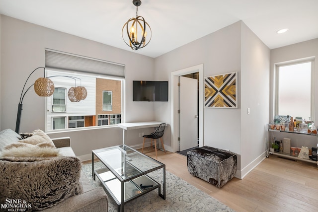 2638 John R St, Detroit, MI 48201 - living area featuring a chandelier, baseboards, light wood-style floors, and recessed lighting