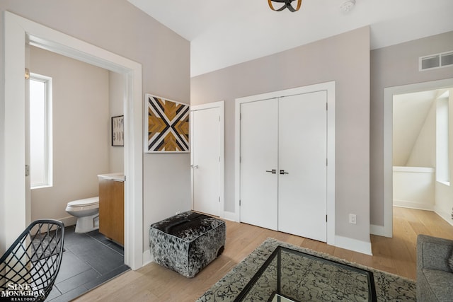 2638 John R St, Detroit, MI 48201 - foyer entrance featuring wood finished floors, plenty of natural light, and baseboards