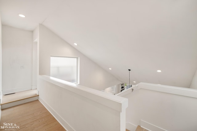 2638 John R St, Detroit, MI 48201 - hall featuring recessed lighting, lofted ceiling, an upstairs landing, and wood finished floors