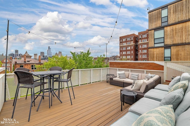 2638 John R St, Detroit, MI 48201 - wooden deck featuring outdoor lounge area, outdoor dining area, and a view of city