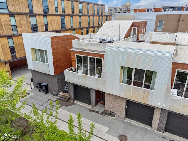 2638 John R St, Detroit, MI 48201 - view of building exterior with a garage