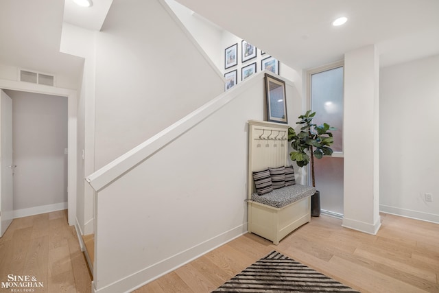 2638 John R St, Detroit, MI 48201 - stairway featuring wood finished floors, baseboards, and recessed lighting